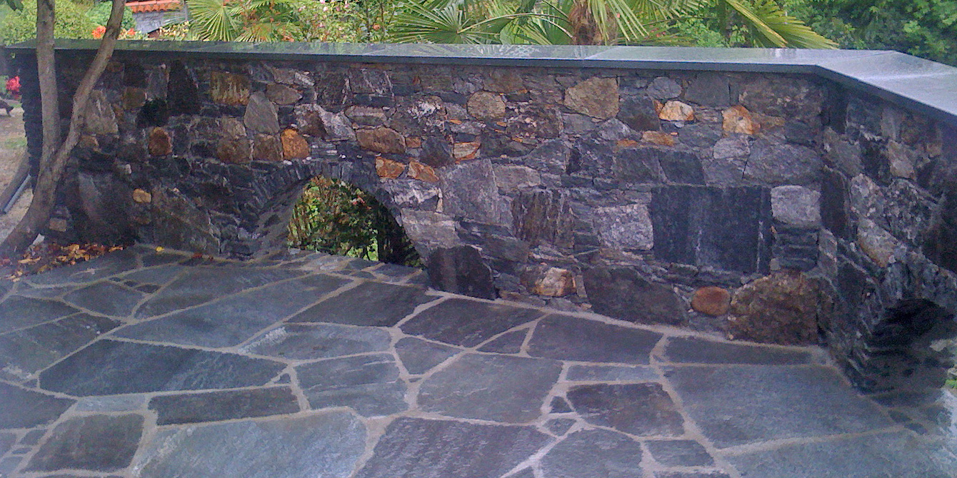 Custom arch with stone walls and floors dedicated to plants