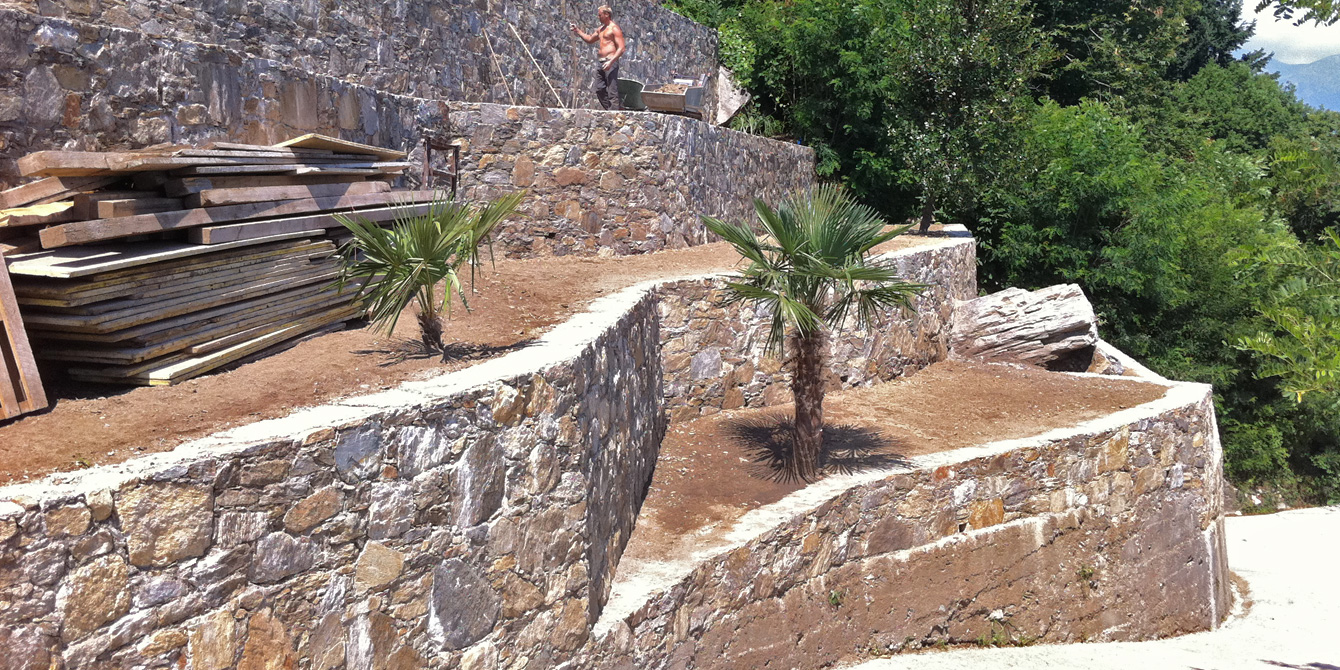 a stone terrace and natural rock